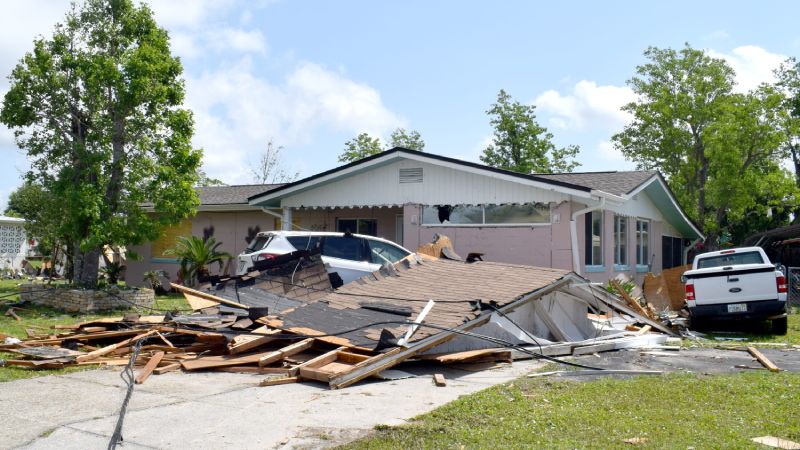 roof of house destroyed by hurricane